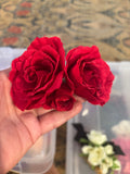 Red roses on hair comb