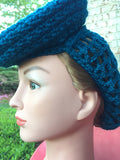 Reproduction hat with snood